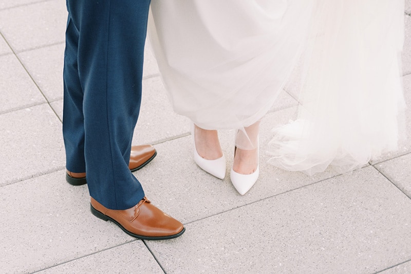 Nathan-and-Zoey-Photography-How-to-Plan-a-Flawed-Wedding-photo-of-bride-and-grooms-shoes