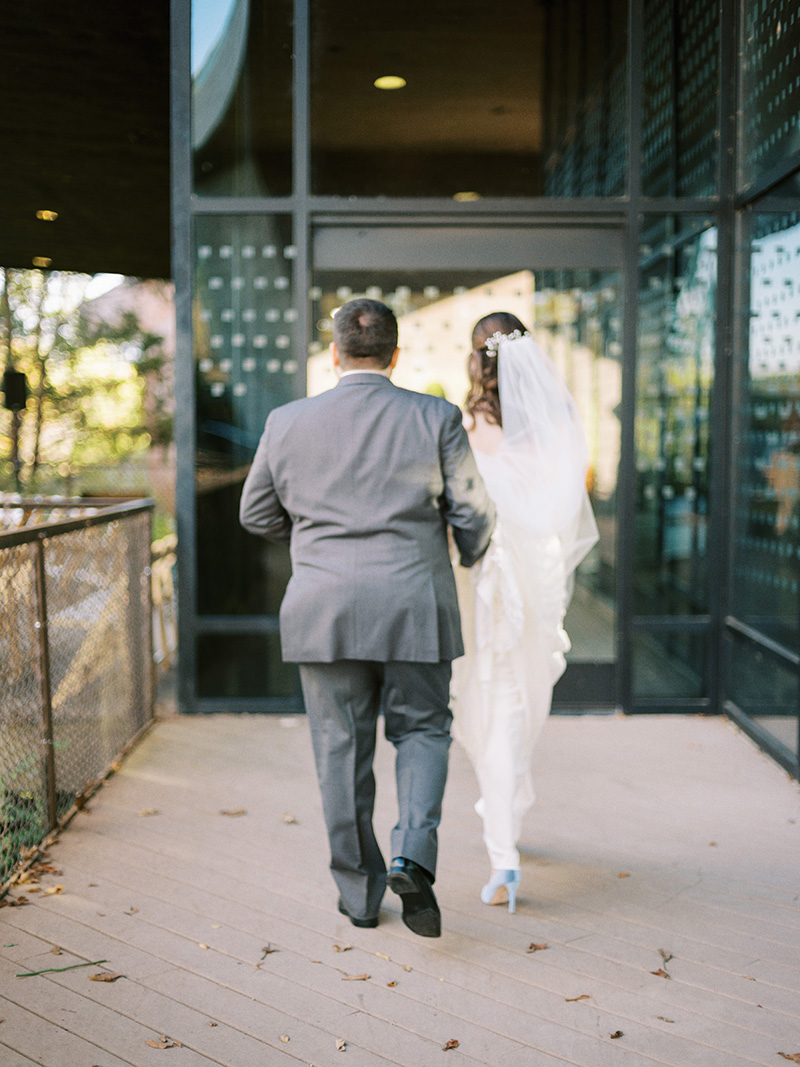 bride and groom walking around trinity river audubon center - nathan and zoey photography